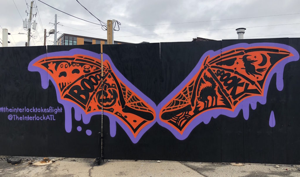 The mural of bat wings at The Interlock